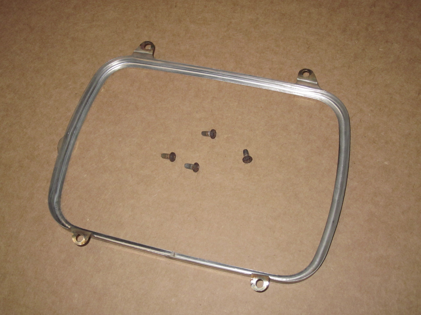 87 88 89 Toyota MR2 OEM Headlight Mount Chrome Bezel - Right