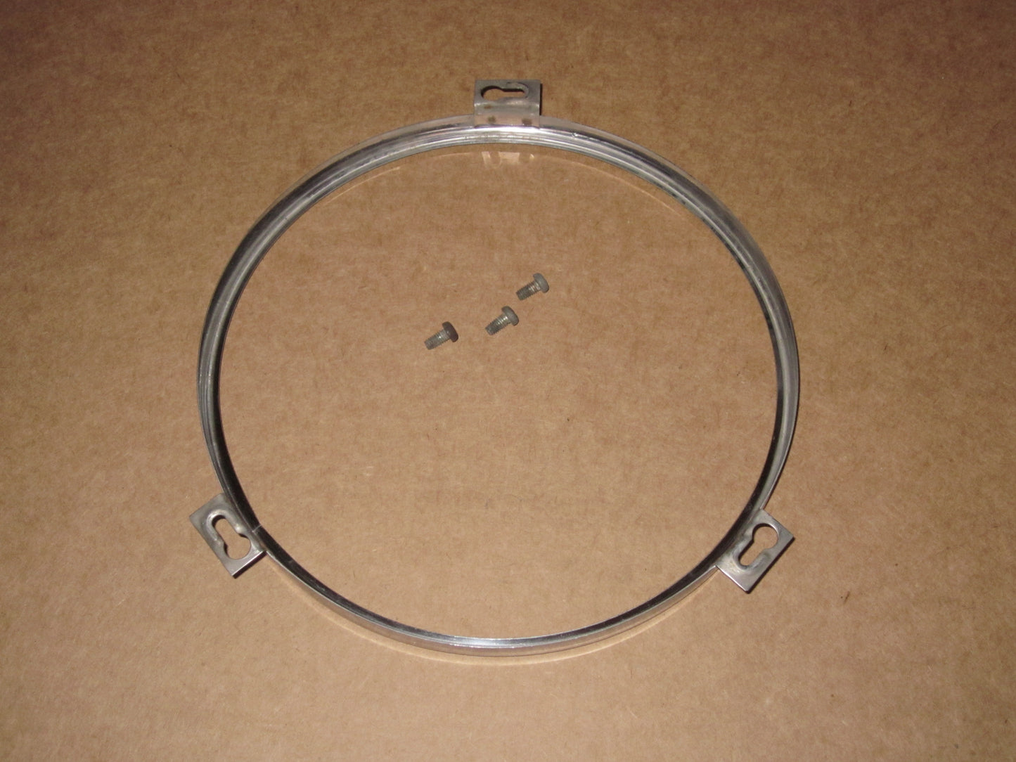 81 82 83 Mazda RX7 OEM Headlight Mount Chrome Bezel