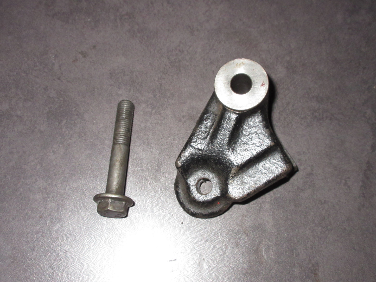 91 92 Mitsubishi 3000GT 3.0L DOHC OEM Timing Belt Tensioner Pulley Bracket