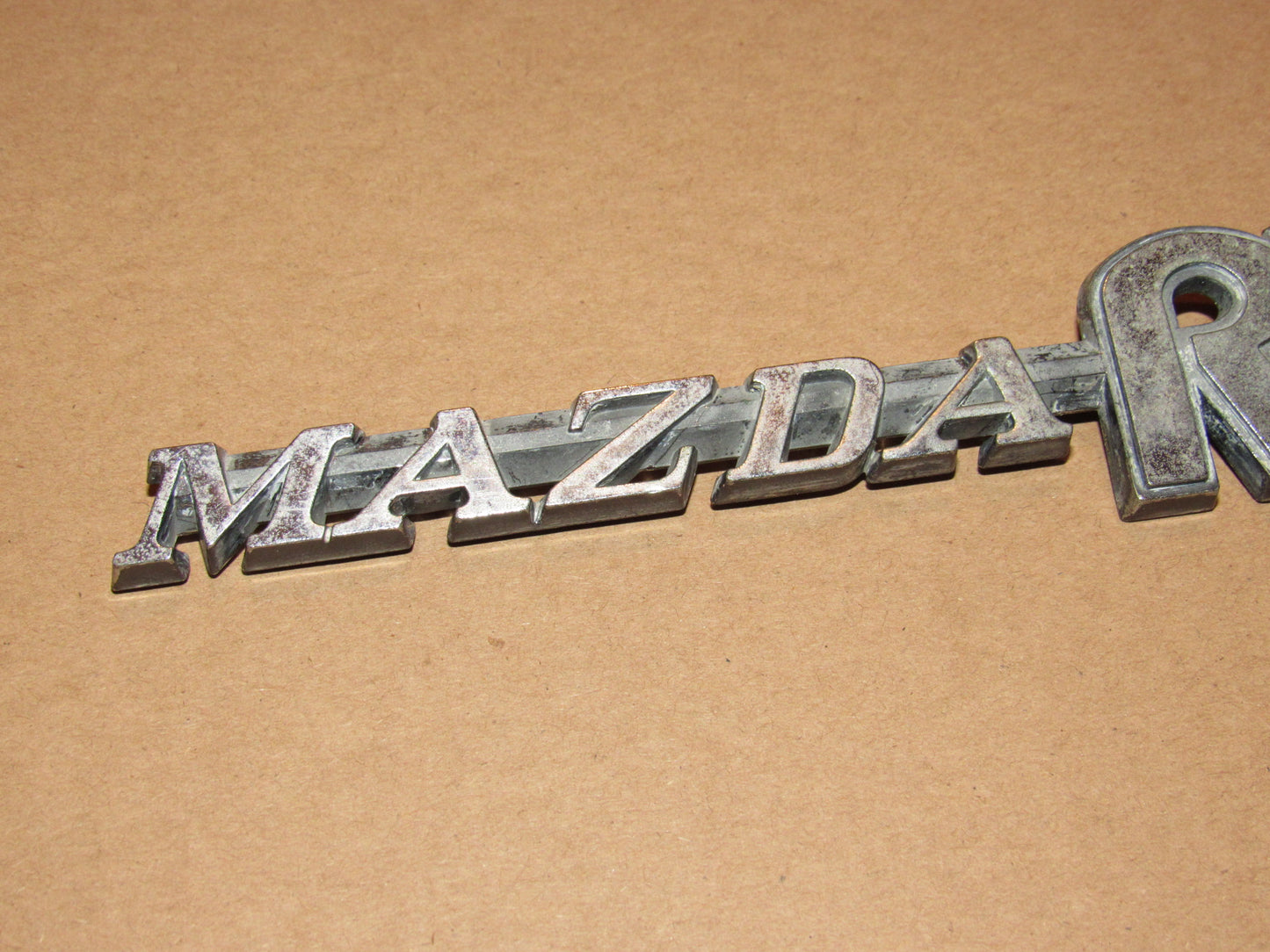 72-78 Mazda RX3 OEM Rear Quarter Panel Badge Emblem