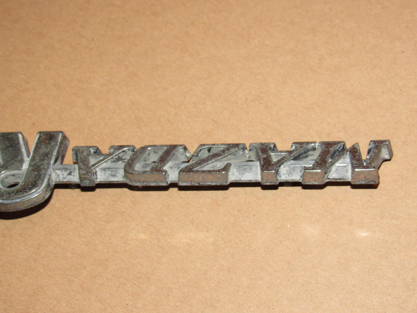 72-78 Mazda RX3 OEM Rear Quarter Panel Badge Emblem