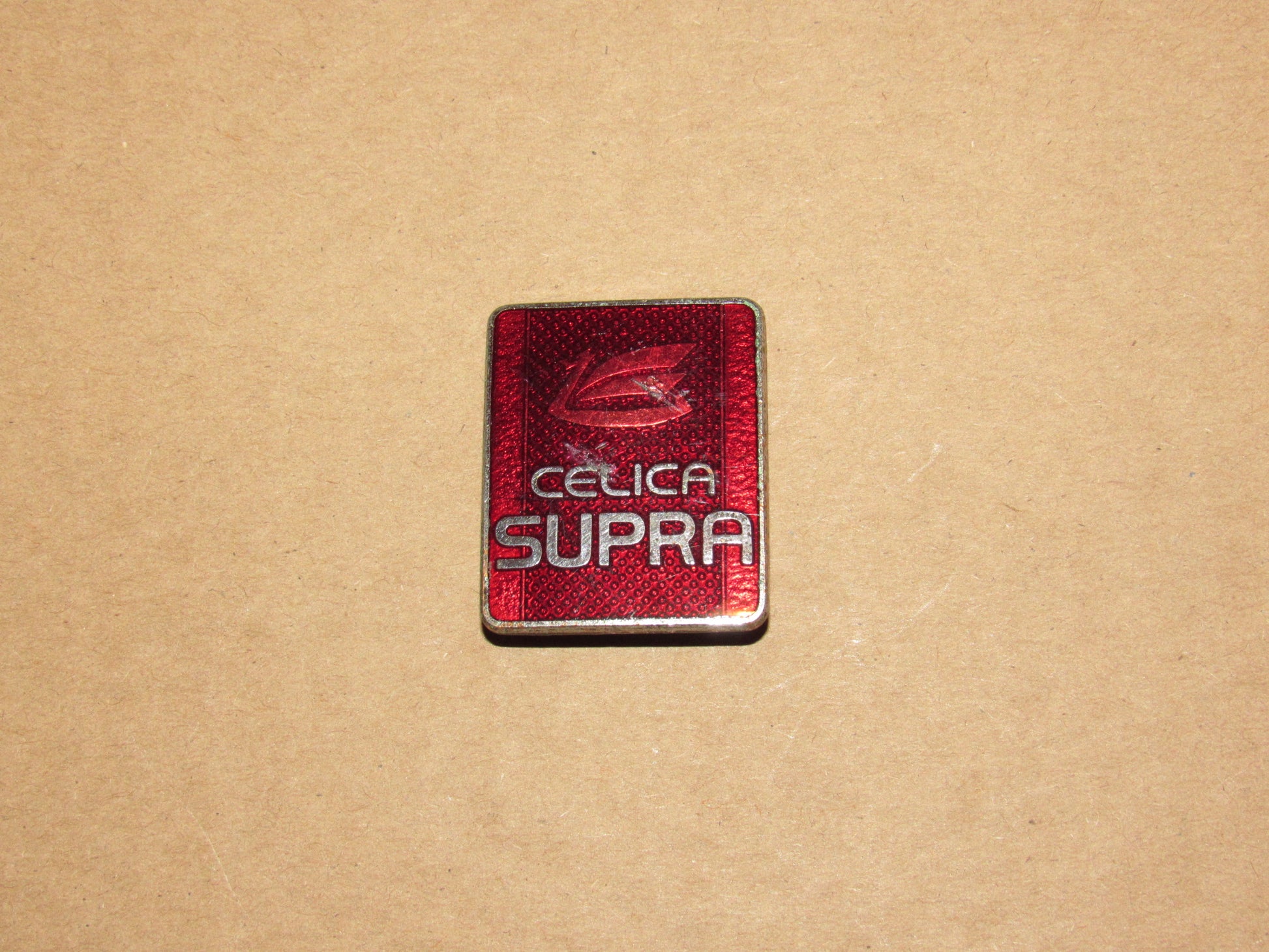 82-85 Toyota Supra OEM Front Bumper Nose Badge Emblem