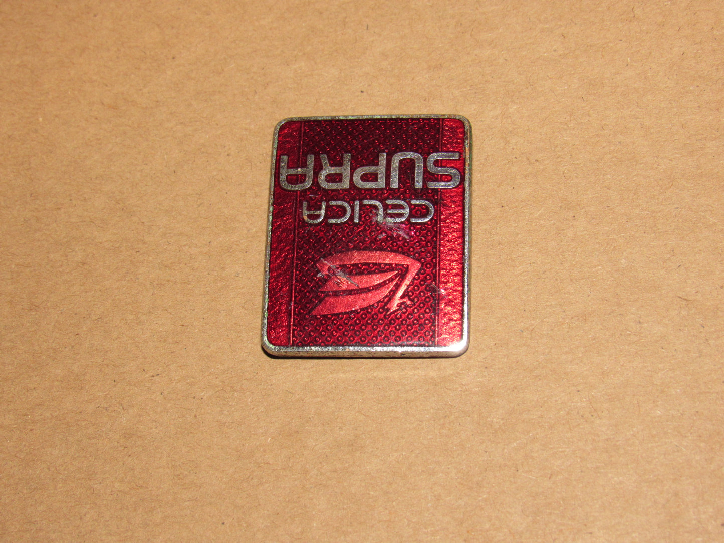 82-85 Toyota Supra OEM Front Bumper Nose Badge Emblem