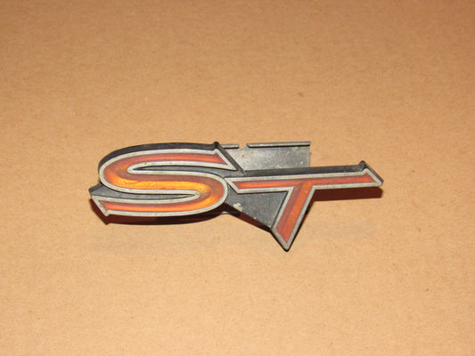 76-77 Toyota Celica OEM Front Grille ST Emblem Badge