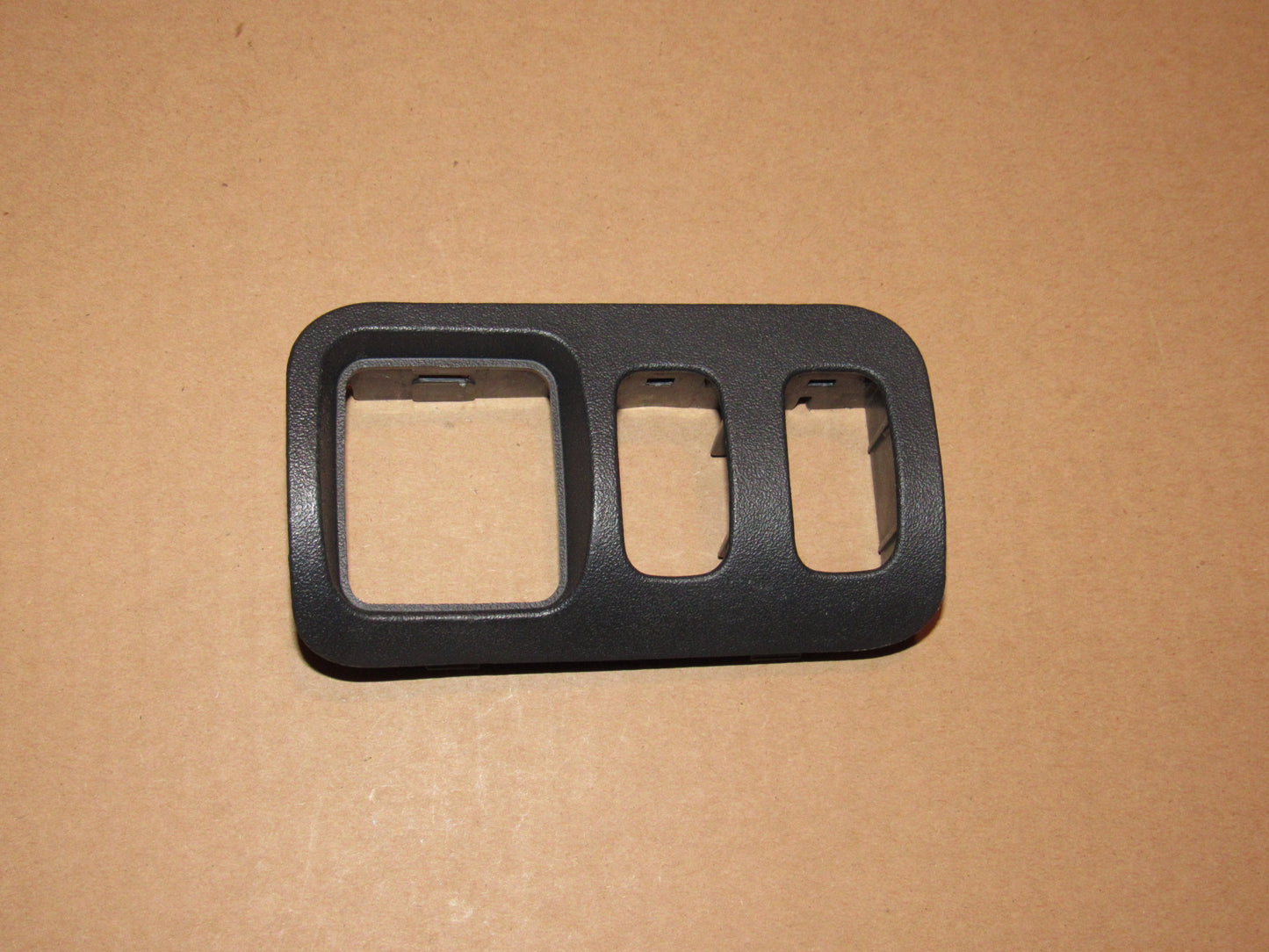 06-12 Mitsubishi Eclipse OEM Power Mirror Switch Holder Trim Bezel